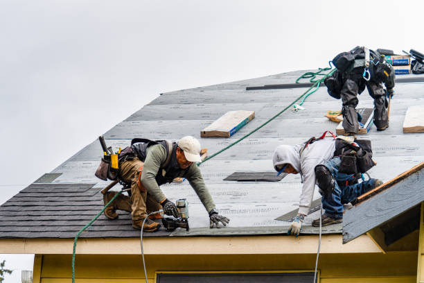 Professional Gutter Installation technician working in Kent, NY